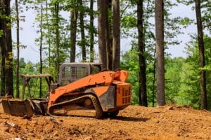 When the Weekend Project Becomes a Professional Job: Knowing When to Call in Heavy Equipment