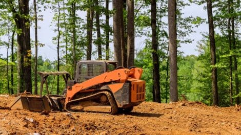 When the Weekend Project Becomes a Professional Job: Knowing When to Call in Heavy Equipment
